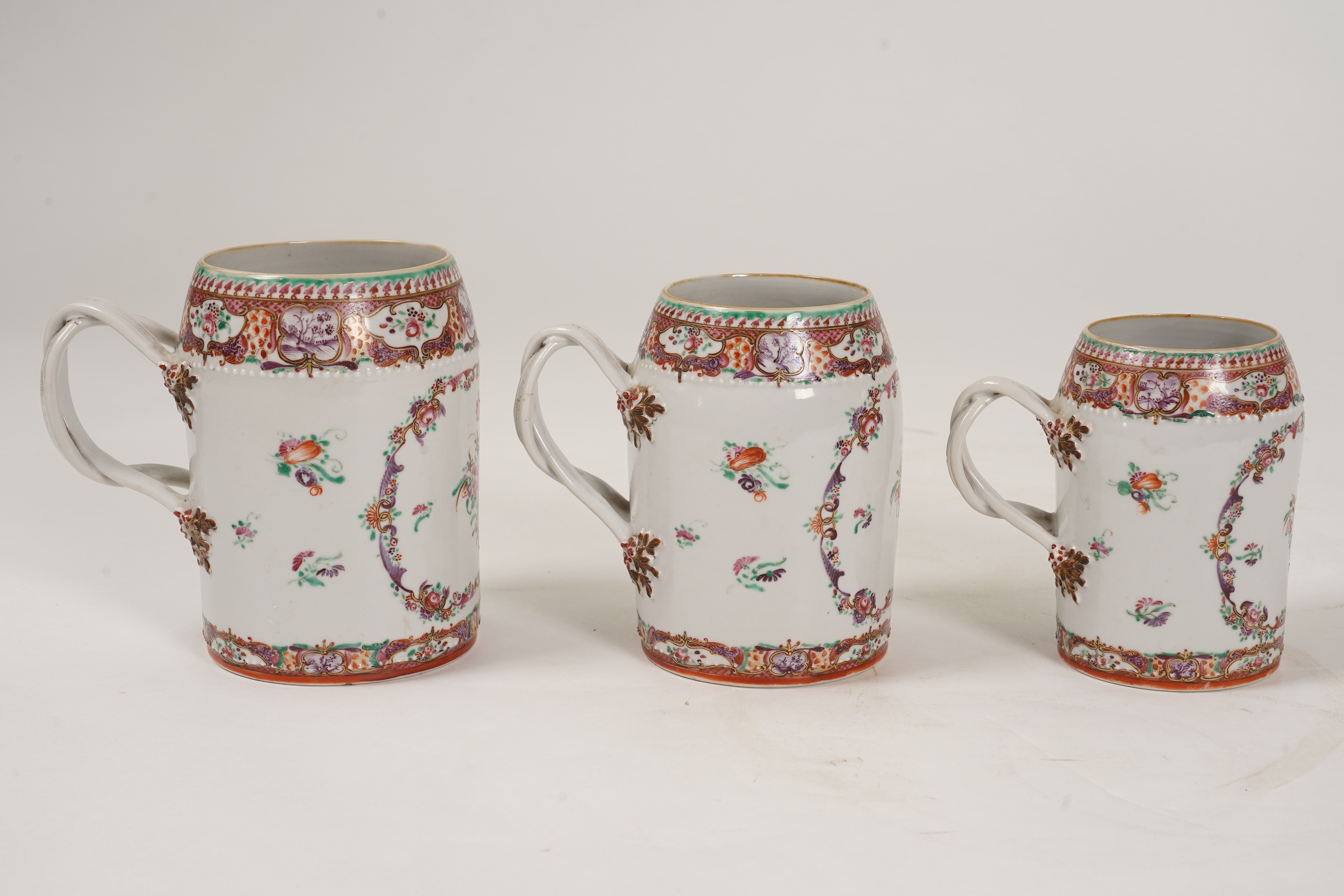 A graduated set of three Chinese export famille rose mugs, Qianlong period